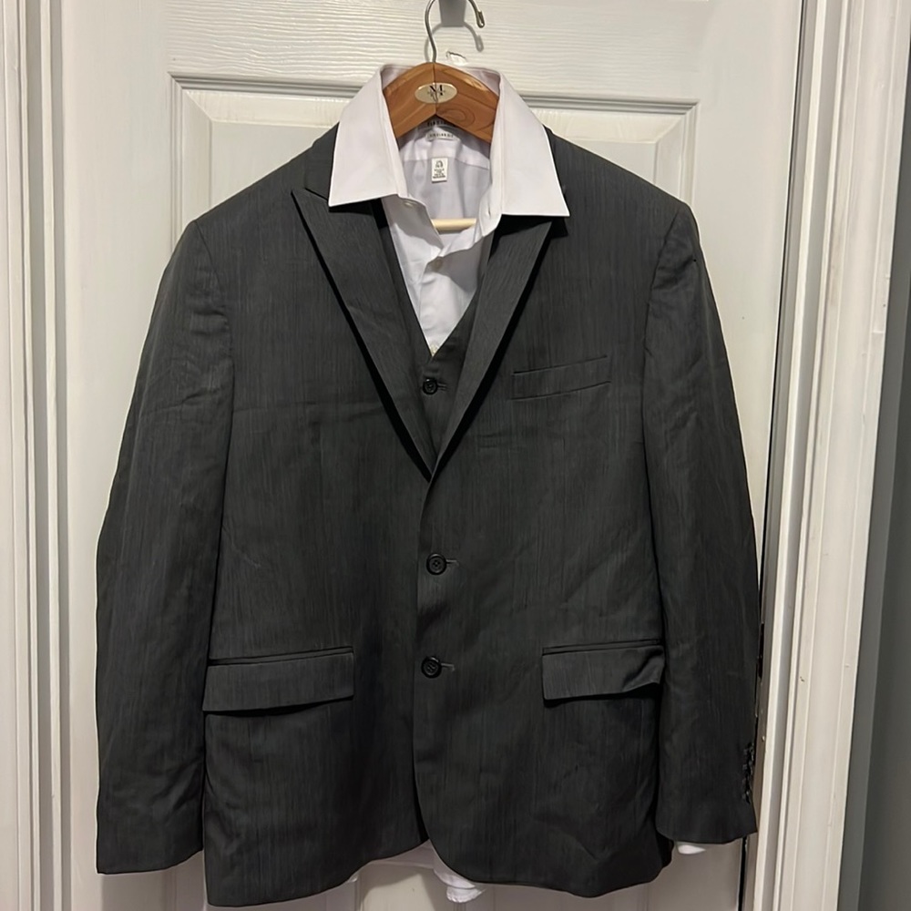 Men grey suit bought from Men’s Warehouse